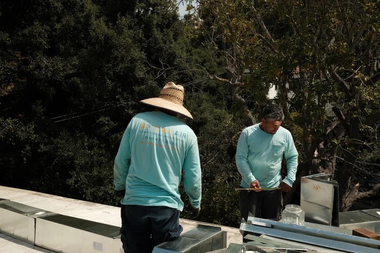 So Cal Air techs installing ductwork on a Los Angeles roof